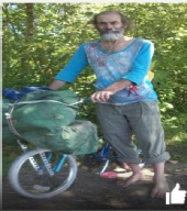 Adrian Wolfe - midget on tiny bike